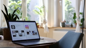 A person analyzing CRM data on a laptop in a bright office