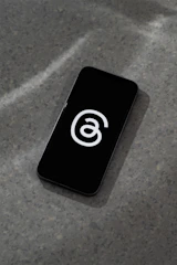 Visual of the background daemon running silently on an iPhone screen.