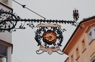 A beautifully crafted metal sign showcasing intricate design and craftsmanship.