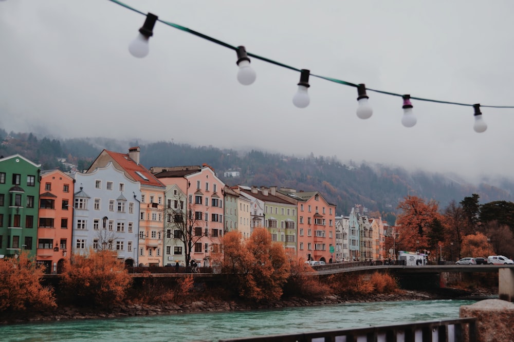 a bunch of buildings that are next to a river