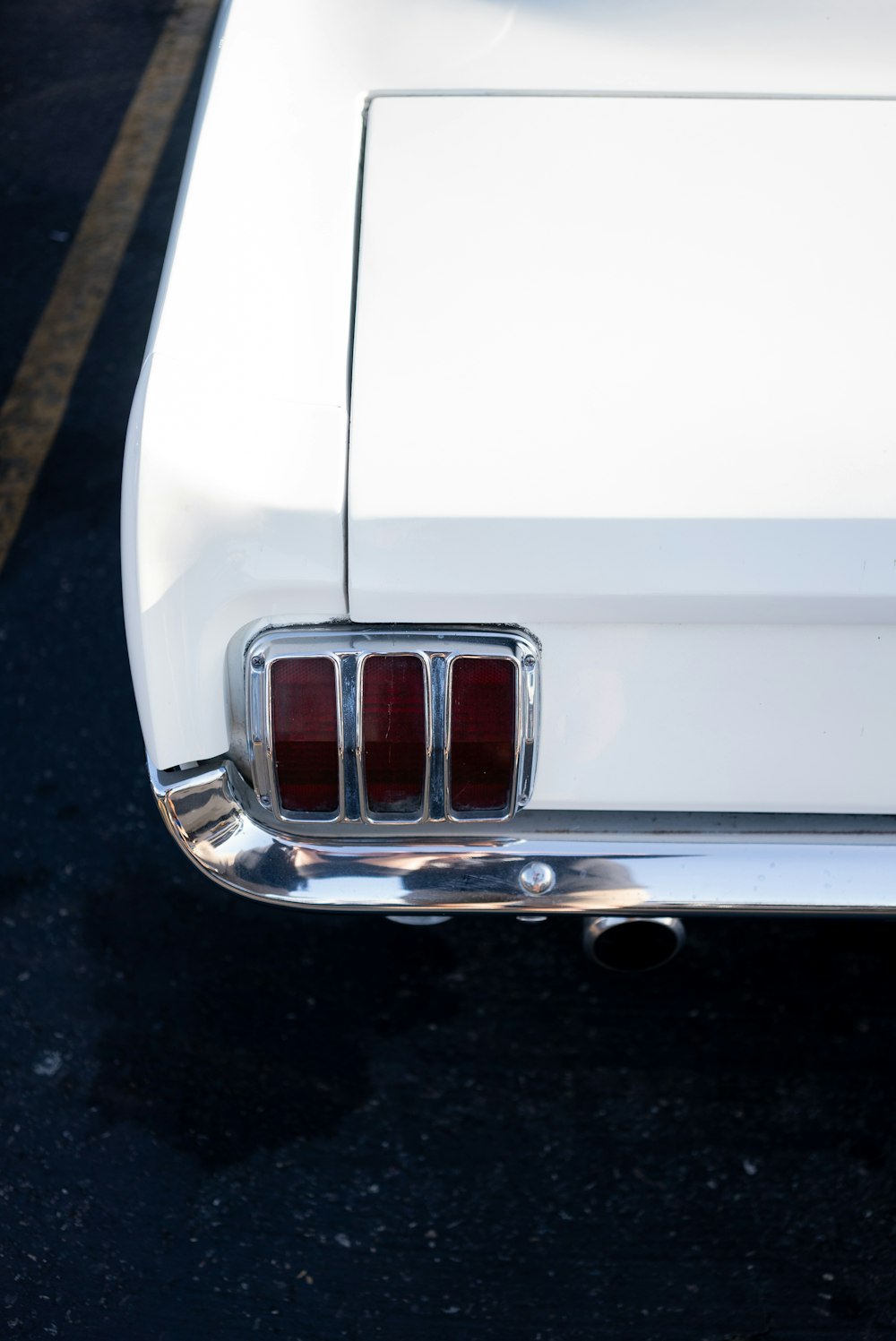 a white car parked in a parking lot