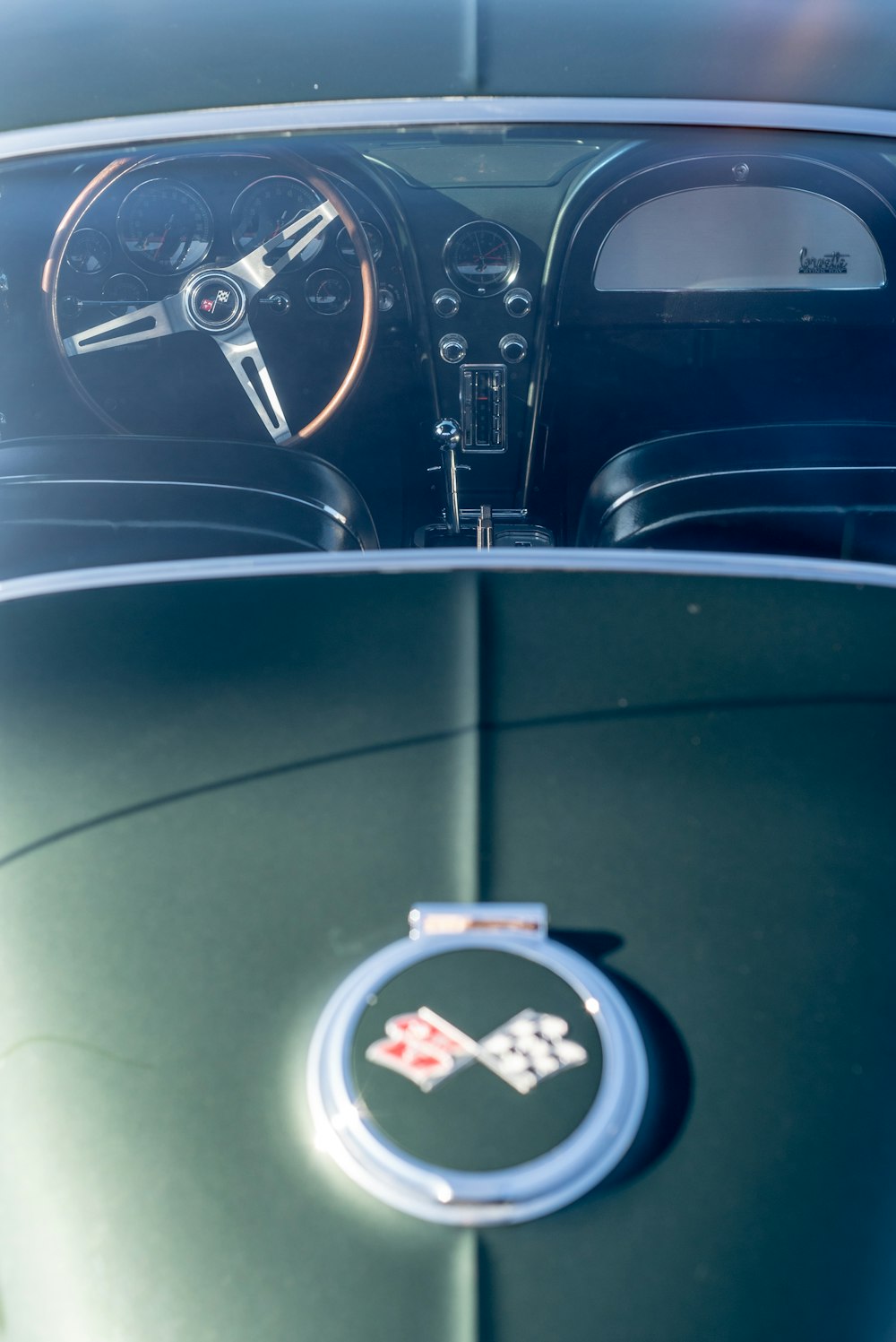 a close up of a car dashboard with a steering wheel