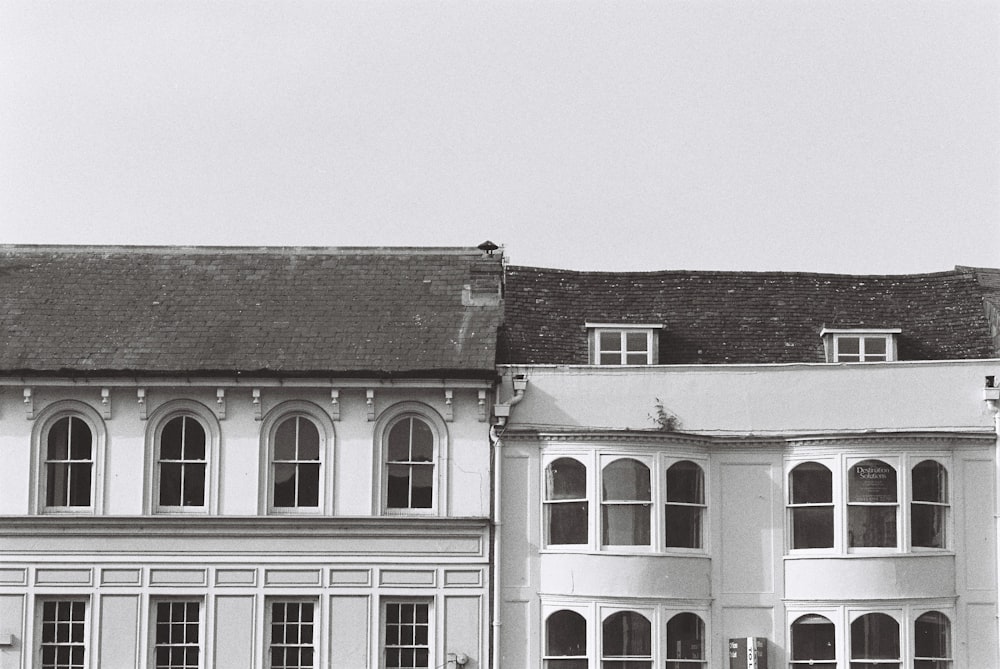 a black and white photo of a large building