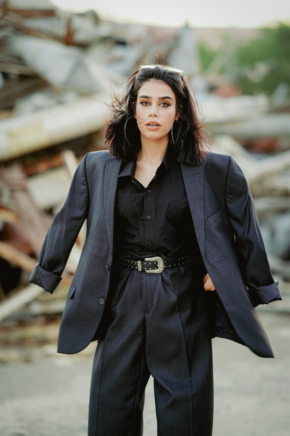 A woman wearing a black suit and black shirt photo – Free Jacket Image on  Unsplash