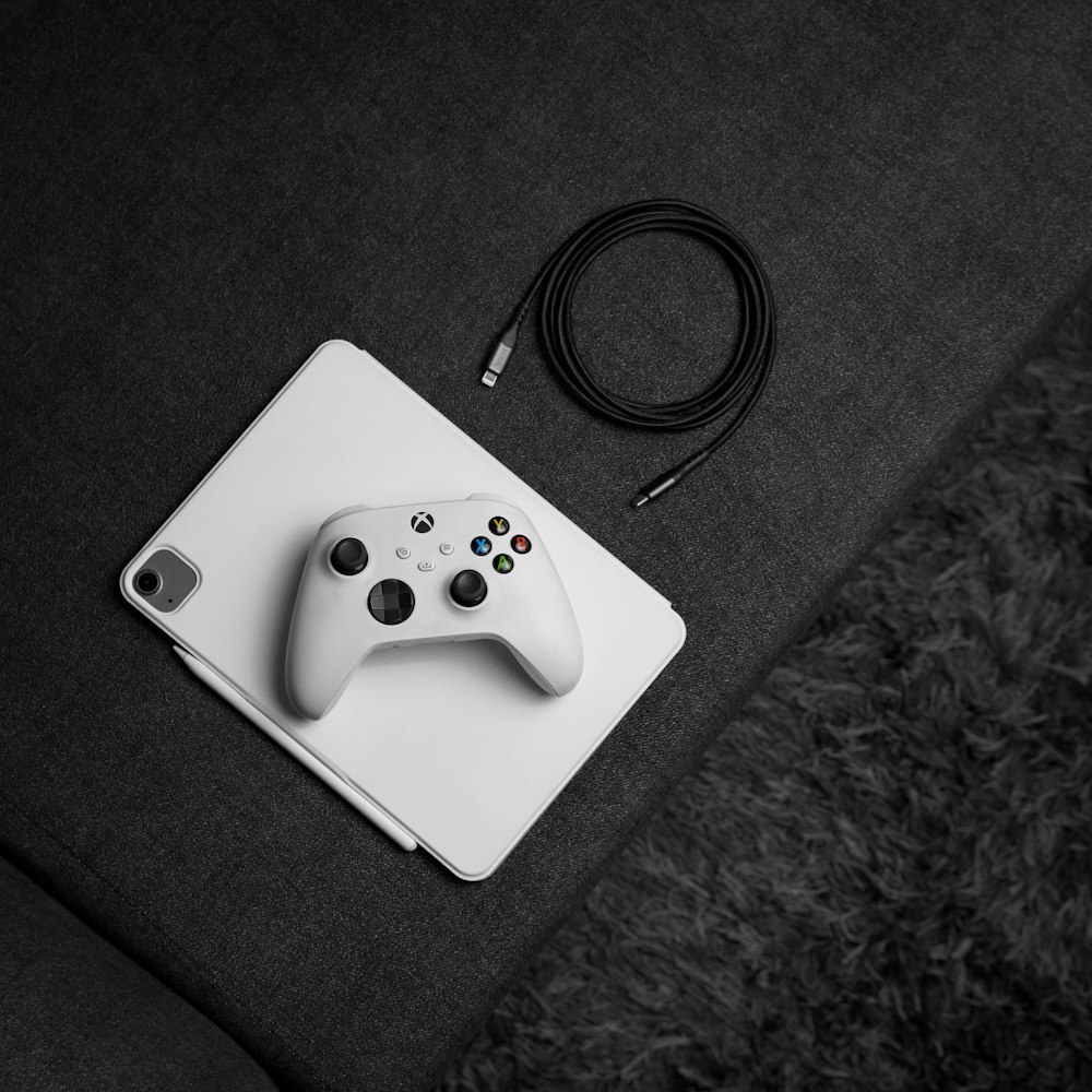 a white controller sitting on top of a table