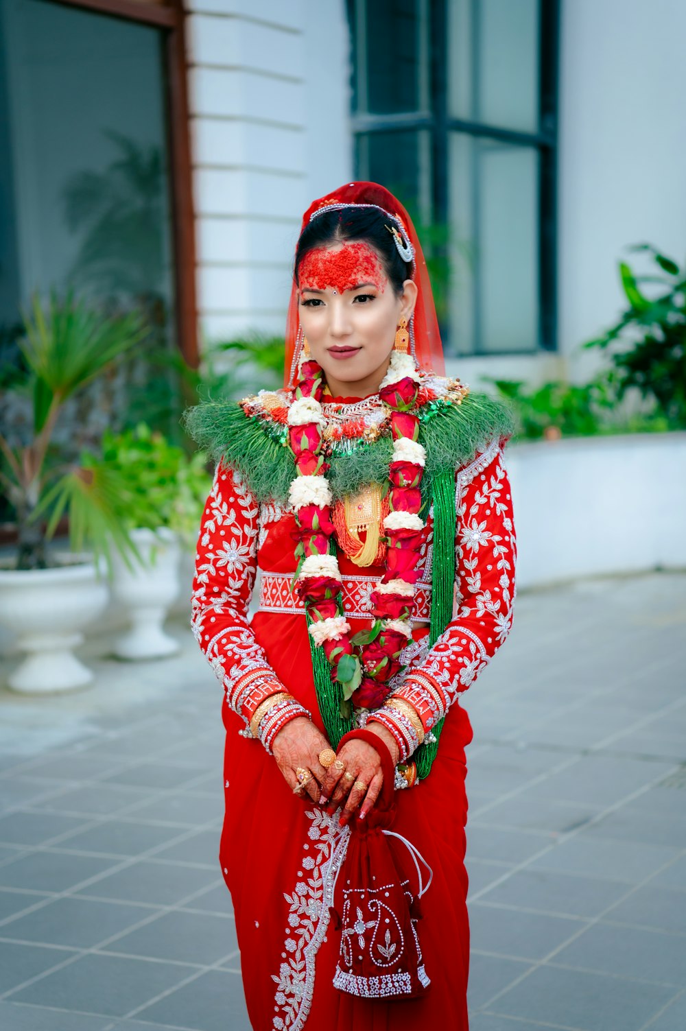 a woman dressed in a red and white outfit