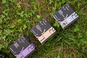 An artistic display of various designed boxes, highlighting the brand's range.