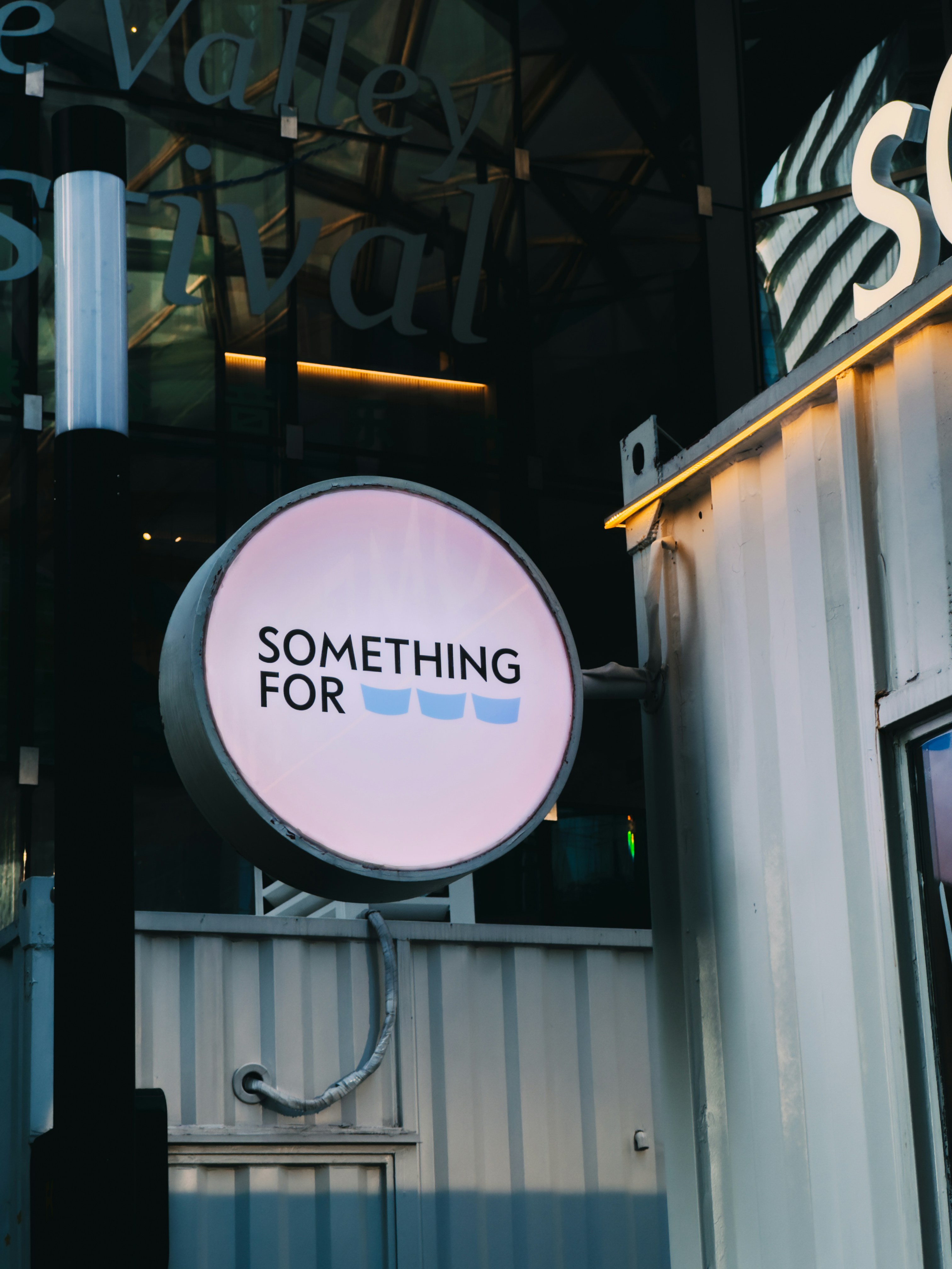 a sign that says something for sale on the side of a building