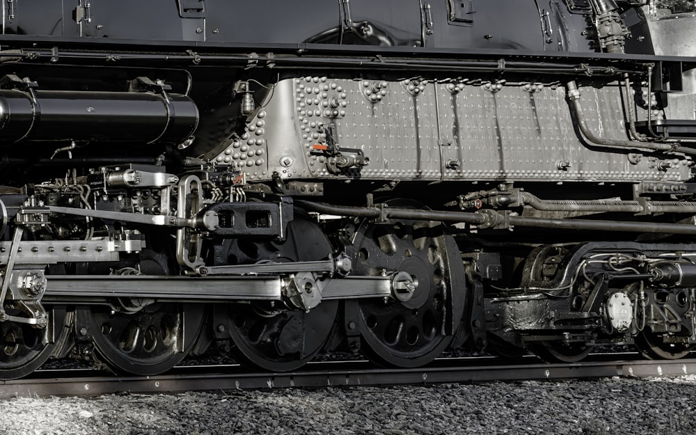 a black and white photo of a train engine