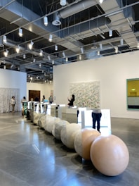An elegant gallery space showcasing Ruibal’s art installations.