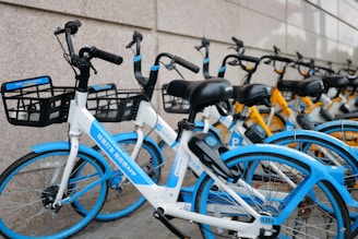 a row of bikes parked next to each other