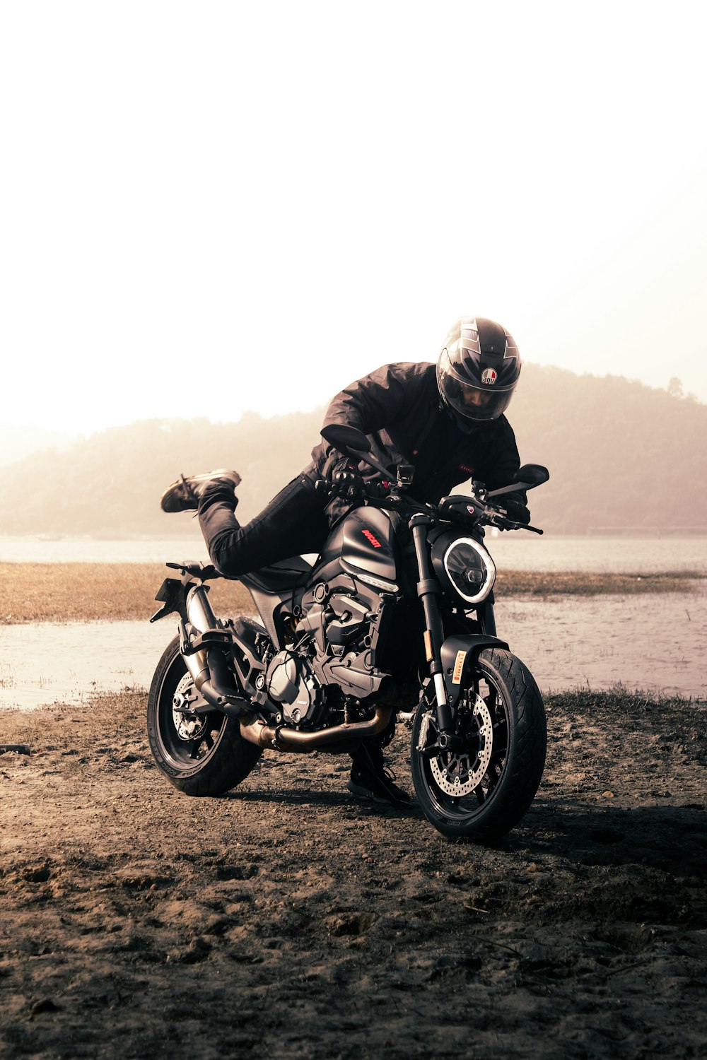 a man riding on the back of a motorcycle