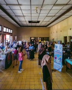 A community health fair with people engaging in activities.