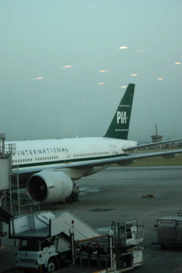 Pakistani workers arriving at an international airport, ready for new opportunities.
