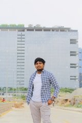 A professional confidently walking forward on a clear path surrounded by open space.