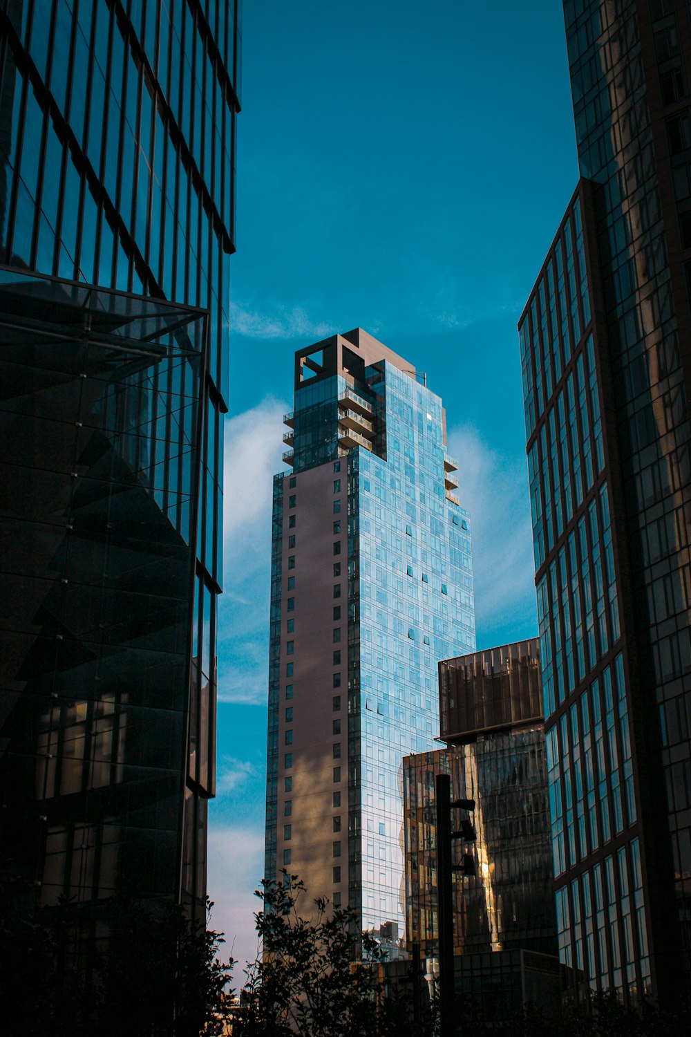 a tall building with a sky background