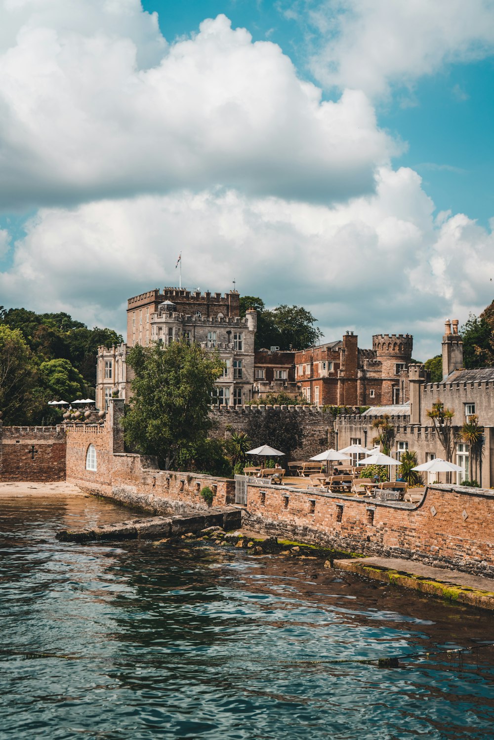 a view of a castle from the water