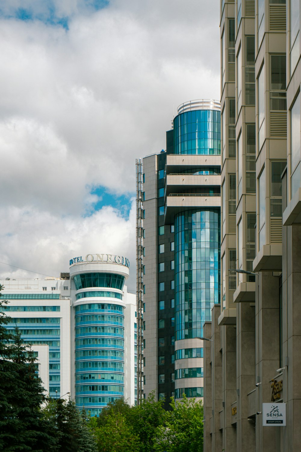 a view of a city with tall buildings in the background