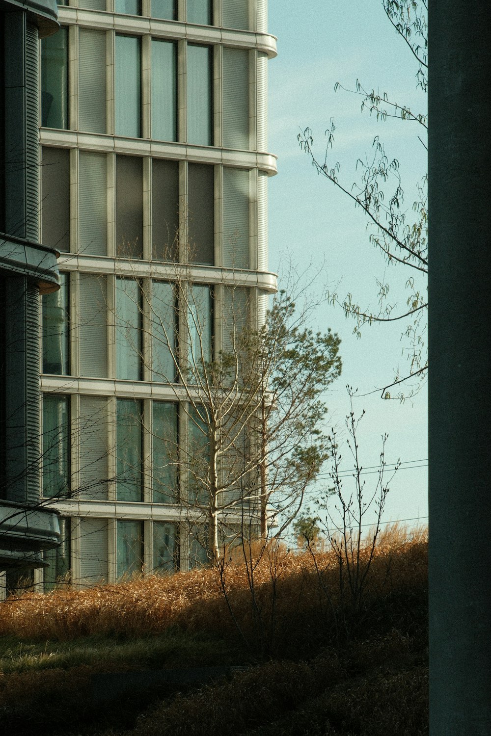 a tall building with a clock on the side of it