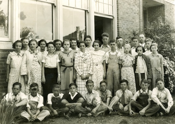 Vintage image of a Sunday school class from the 1950s with children and teachers smiling.