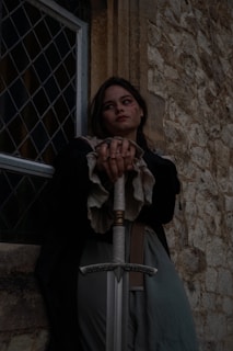 A tense moment showing a high-born samurai lord in armor, gazing thoughtfully from a castle balcony.