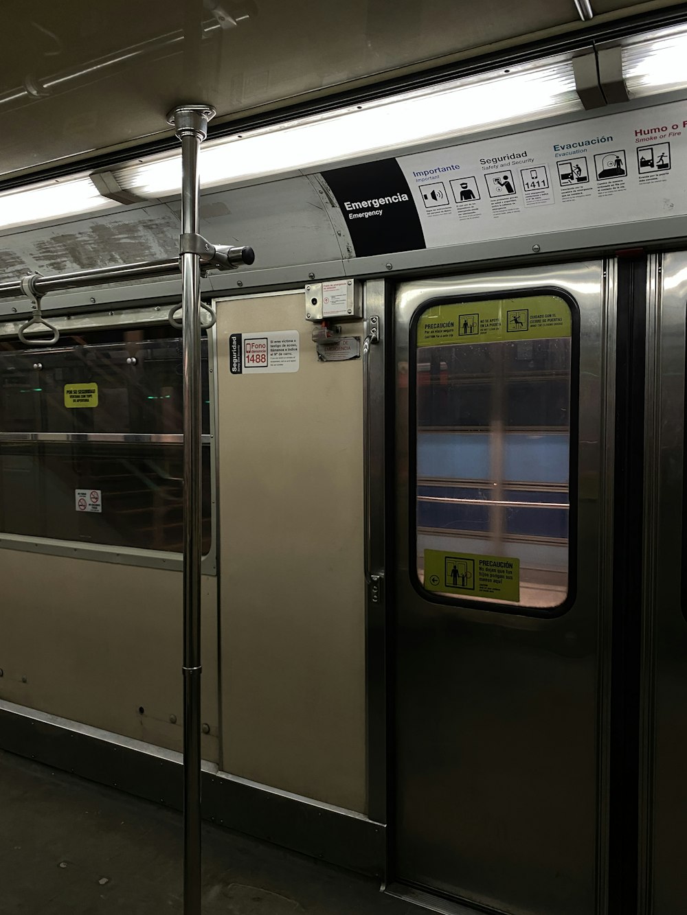 an empty subway car with its doors open