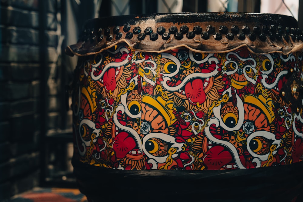 a drum with a colorful design on it