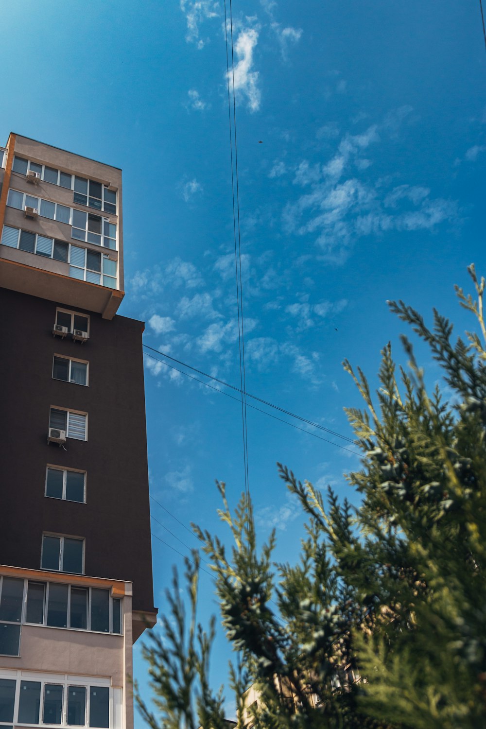 a tall building with a clock on the top of it