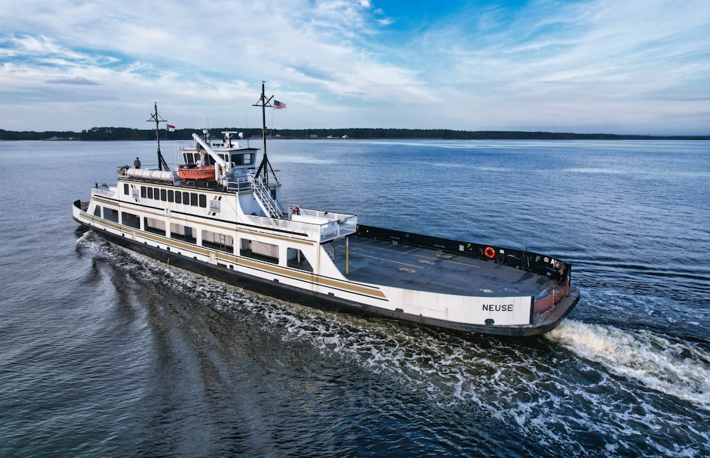 a large boat traveling across a large body of water