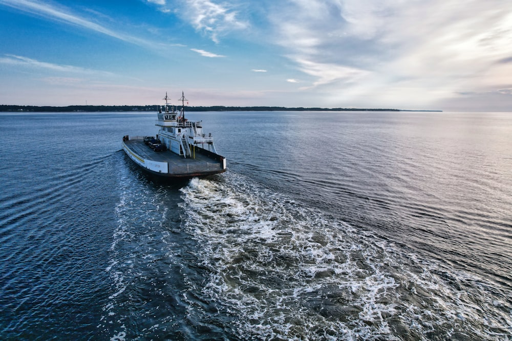 a large boat traveling across a large body of water