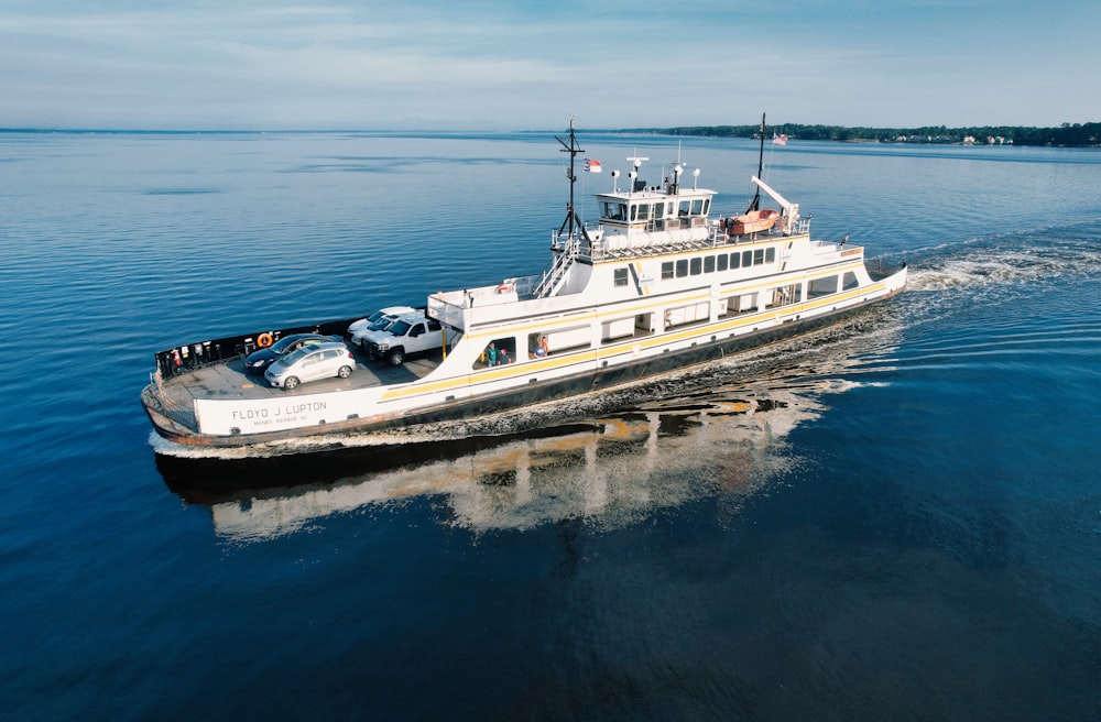 a large boat floating on top of a body of water