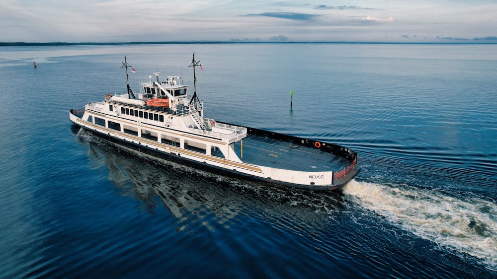 a large boat traveling across a large body of water