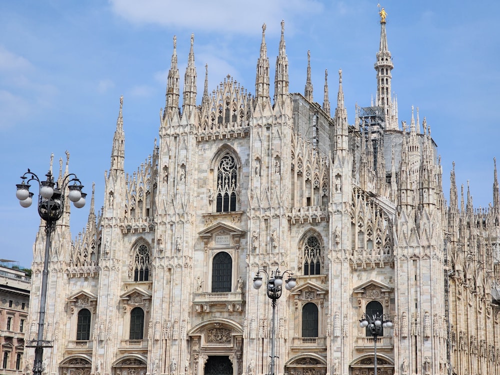 a large cathedral with a clock on the front of it