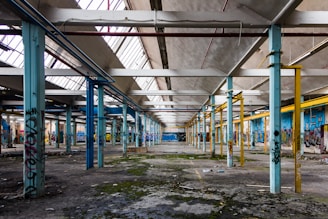 an abandoned building with graffiti on the walls