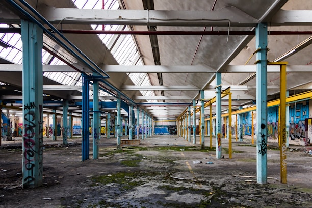 an abandoned building with graffiti on the walls