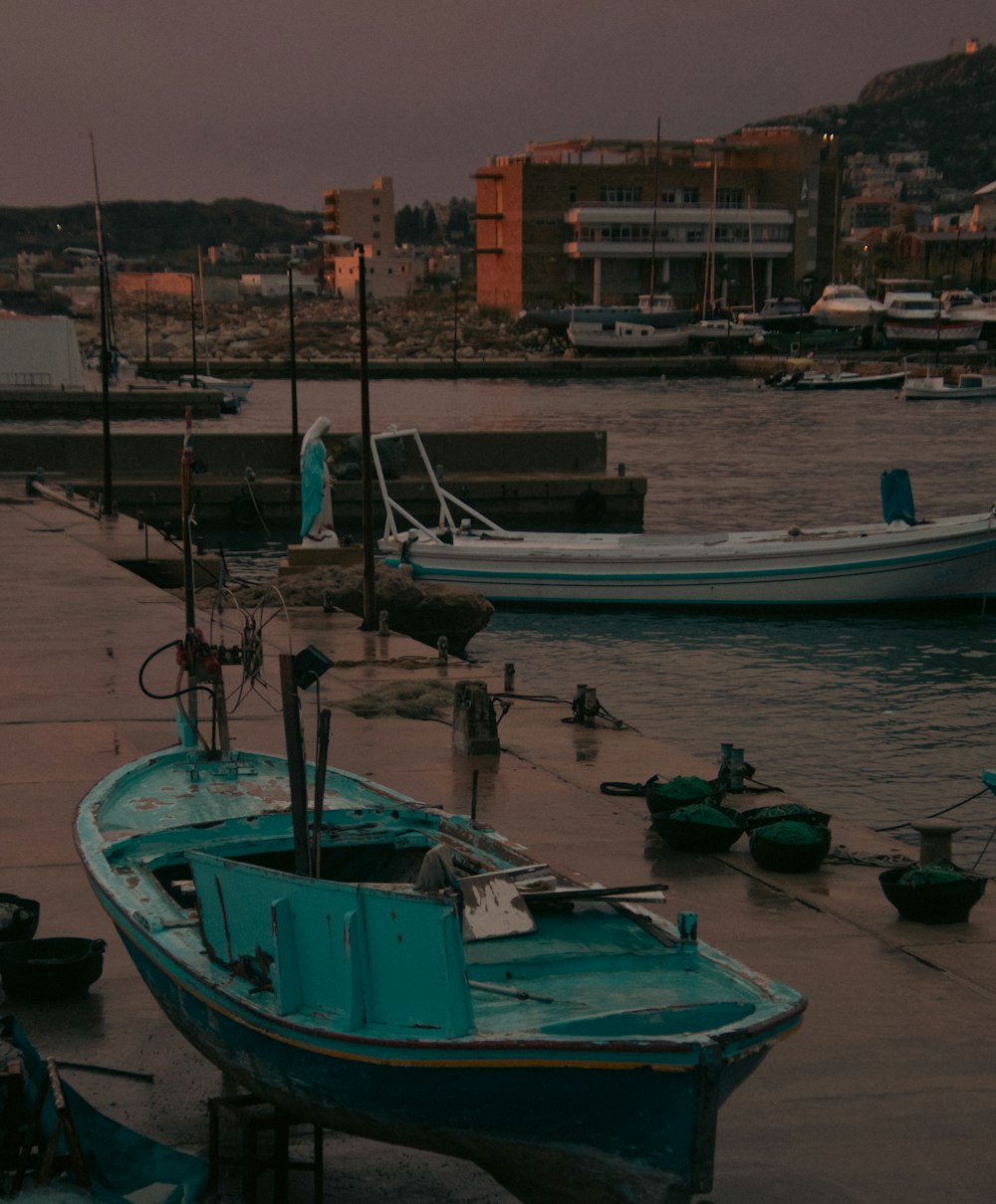 a group of boats that are sitting in the water