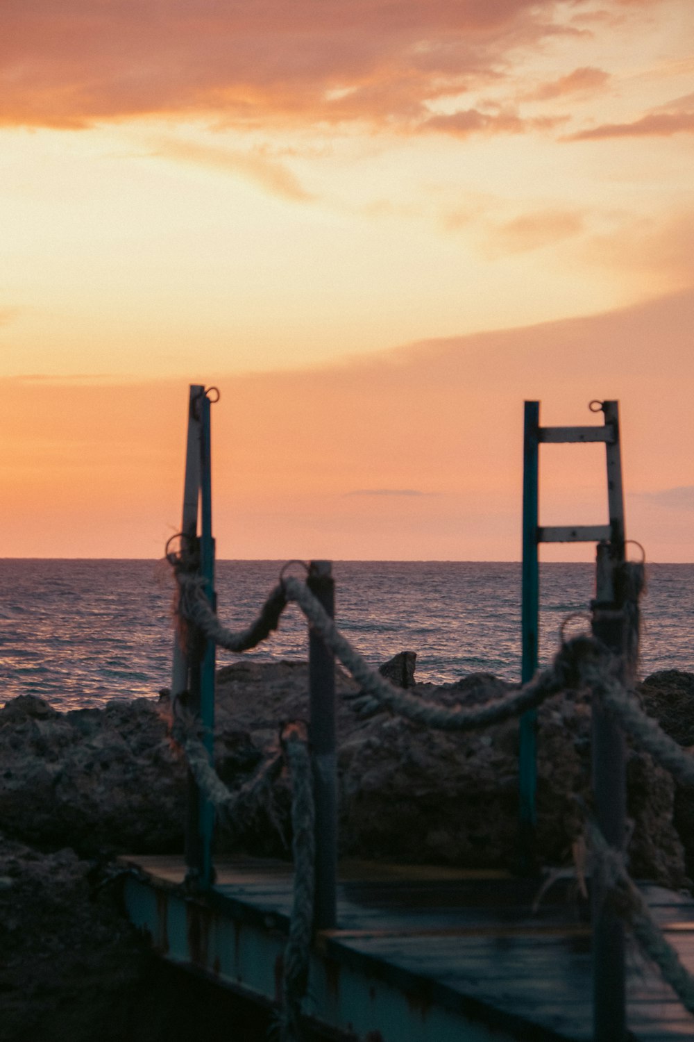 a boat sitting on top of a wooden dock