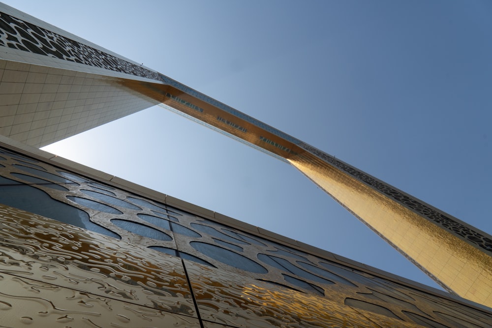 a tall building with a sky background