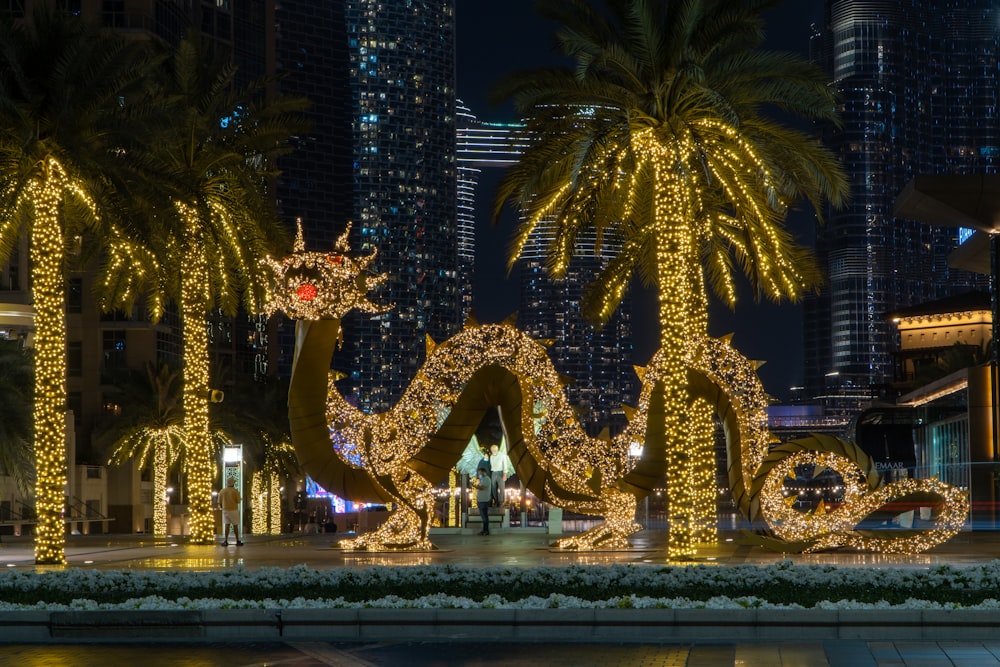 a large lighted dragon in the middle of a street