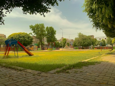 Community park with children playing and benches