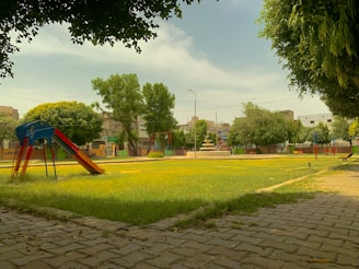 Community park with children playing and benches
