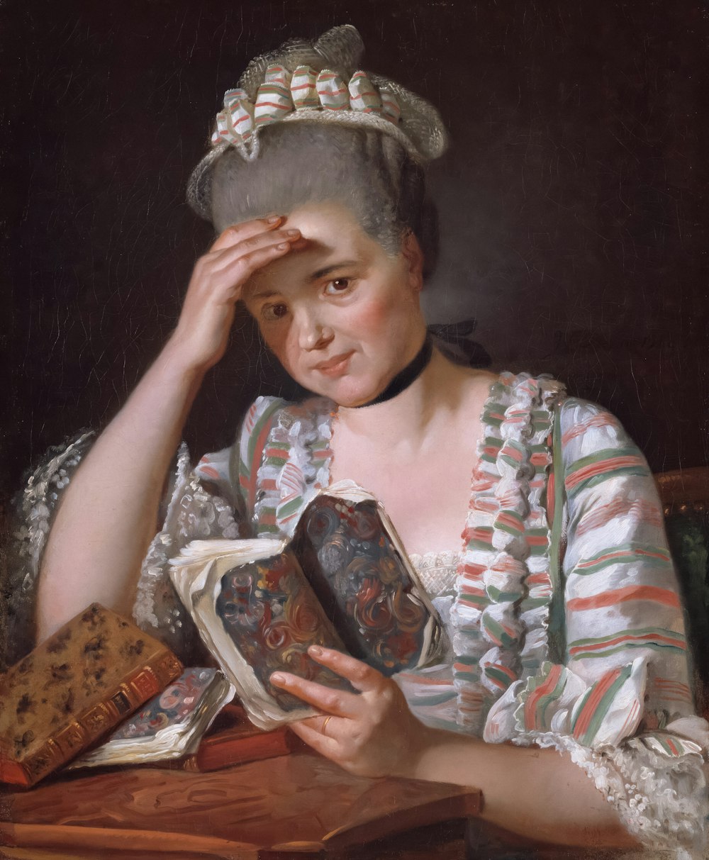 a painting of a woman holding a book