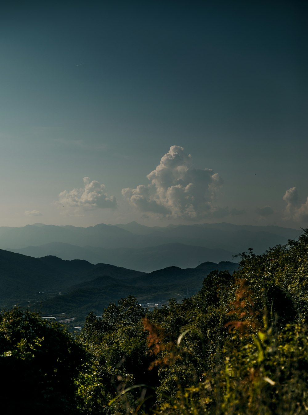 a view of a mountain range from a distance