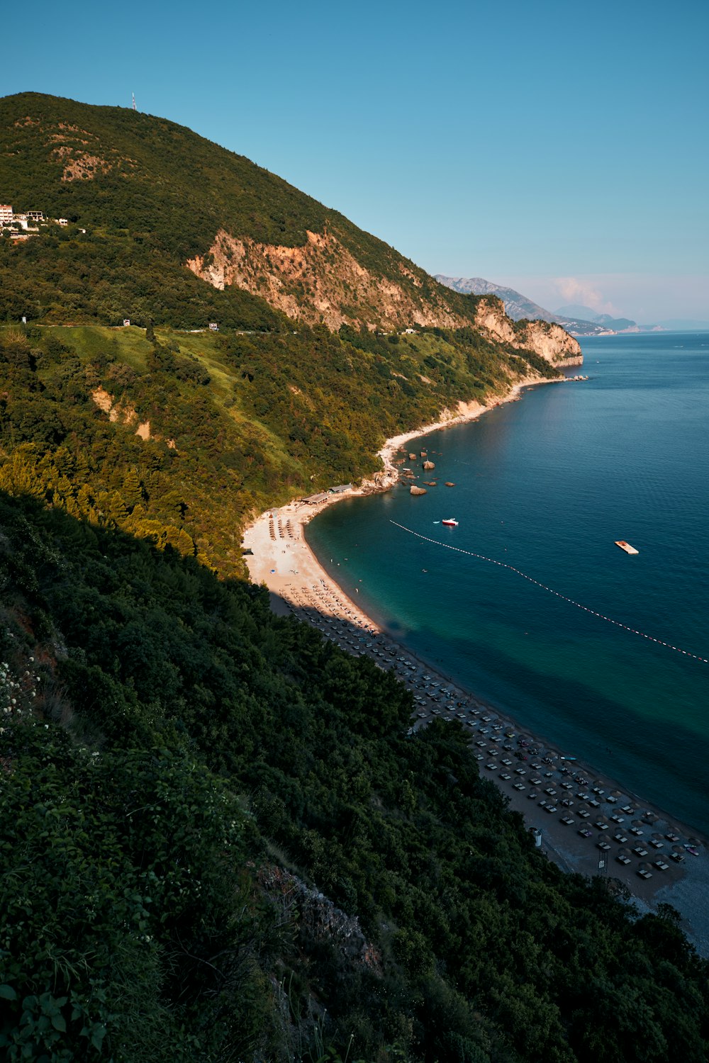 a view of a beach from a hill