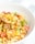 A vibrant salad with colorful vegetables and a light dressing.