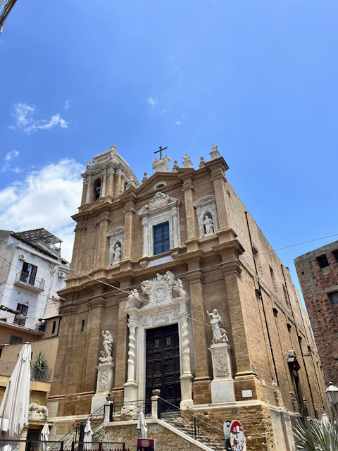 a church with a steeple and a clock tower