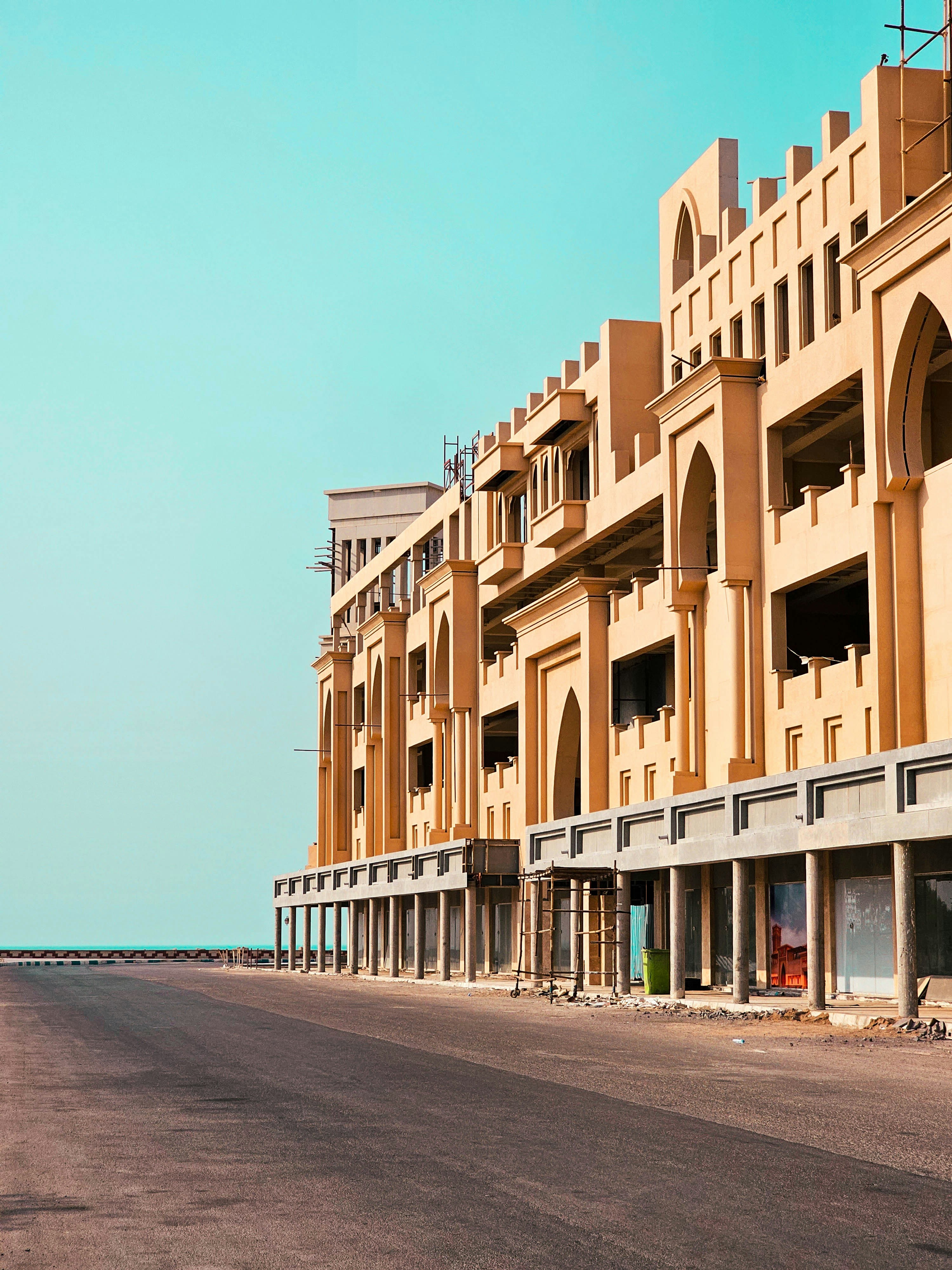a row of buildings on the side of a road