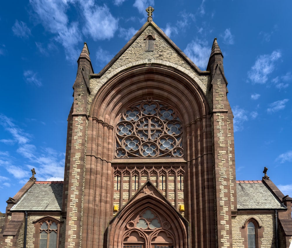 a large church with a clock on the front of it