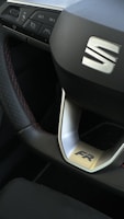 A sporty steering wheel designed for high-performance vehicles.
