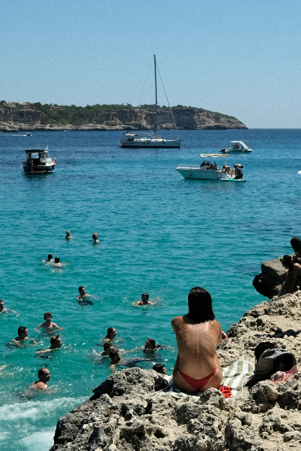 a group of people swimming in a body of water